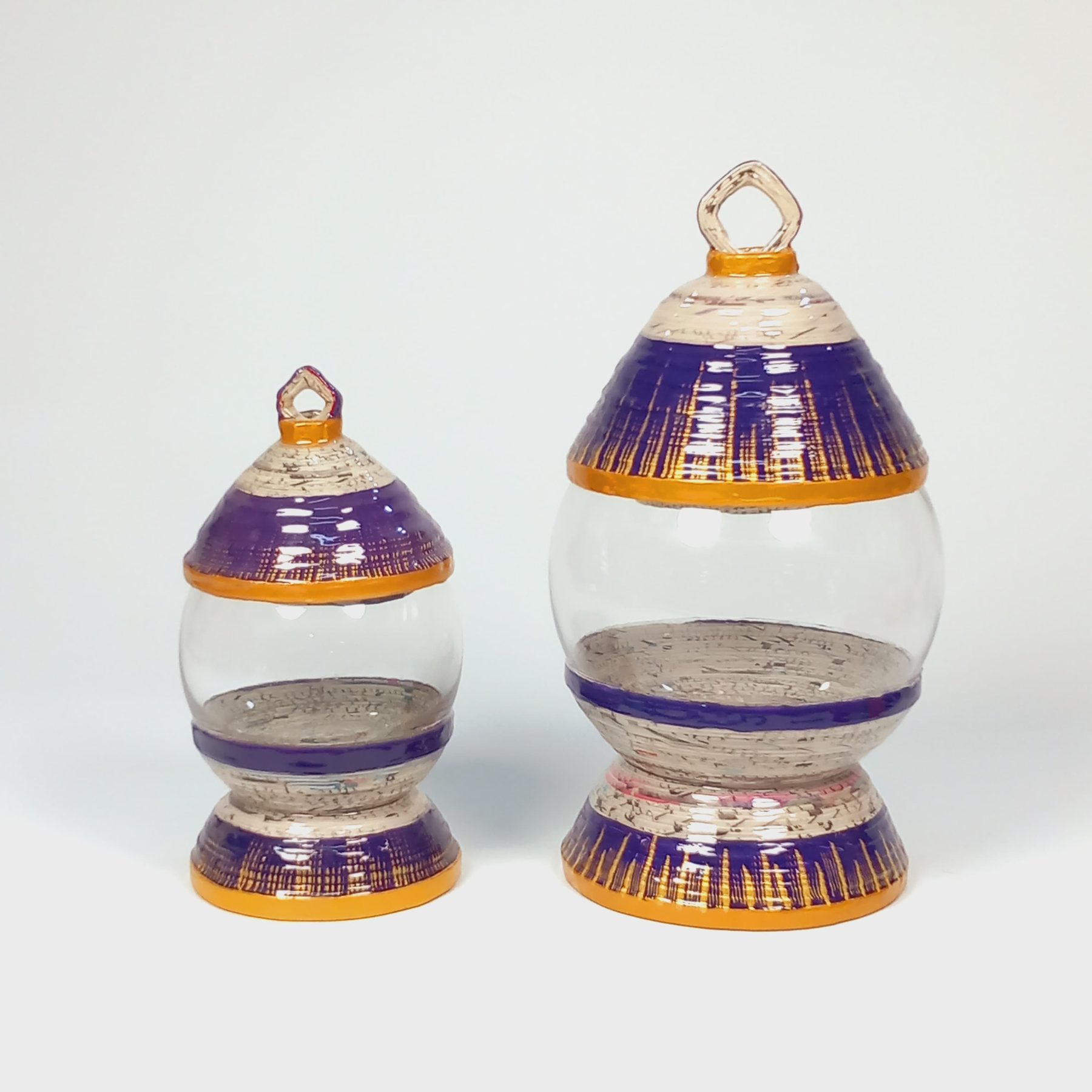 Purple lidded glass jars